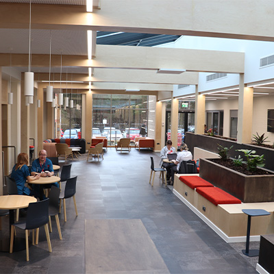 Staff enjoying the communal space at CHI, Stafford